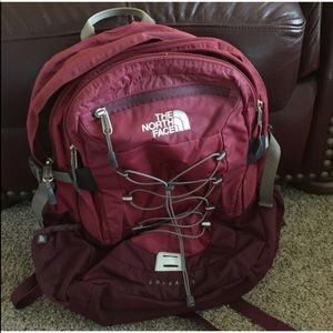 Maroon and pink north face borealis backpack